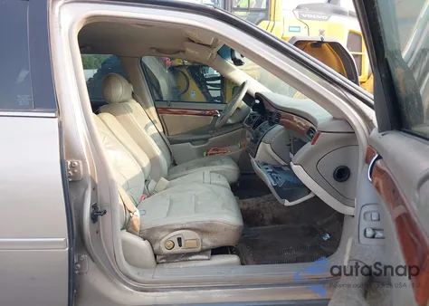 2003 Cadillac Deville из США, поврежденный, VIN 1G6KD54Y43U158030